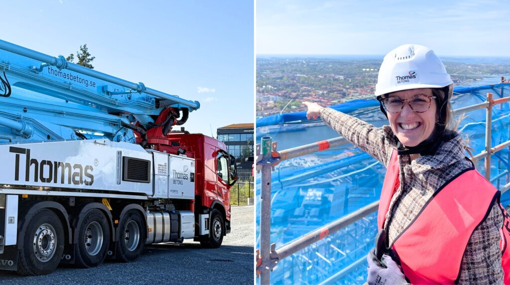 En betongklädd betongklädsel pekar mot utsikten från byggnadsställningen; en röd lastbil med en blå kran står parkerad i närheten.